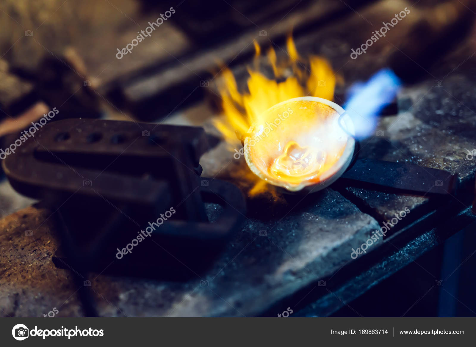 Goldsmith melting metal Stock Photo by ©nd3000 169863714