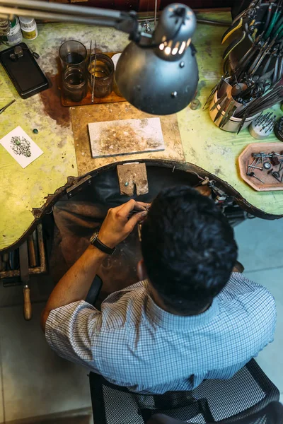 Craftsman working on workbench — Stock Photo, Image