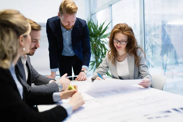 Business people and architects collaborating — Stock Photo, Image