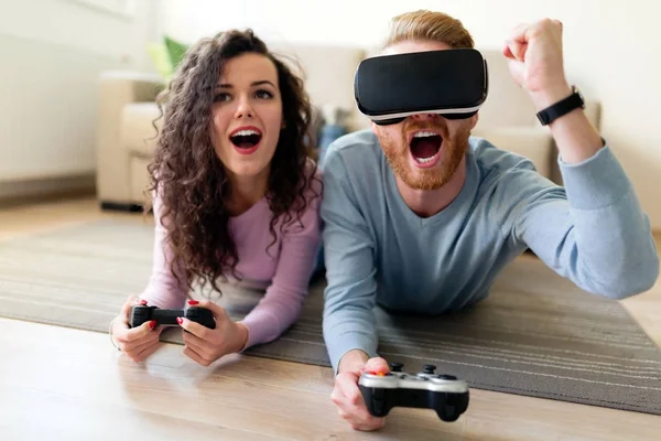 young couple playing video games