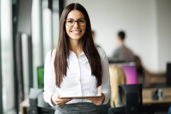 Businesswoman holding digital tablet — Stock Photo, Image