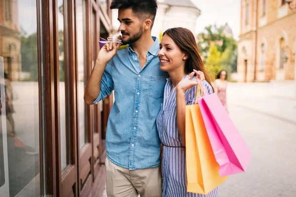 Loving couple enjoy shopping together — Stock Photo, Image