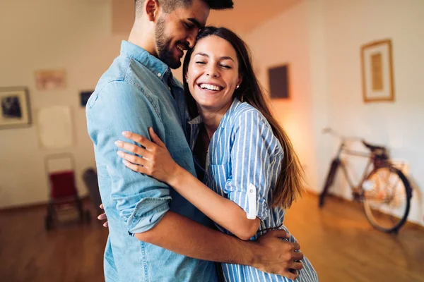 Beautiful couple hugging — Stock Photo, Image