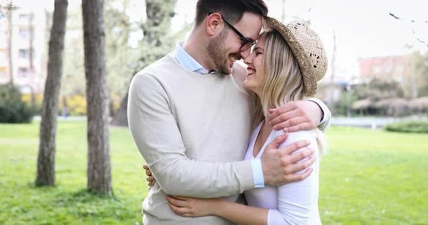 Loving couple hugging in park — Stock Photo, Image