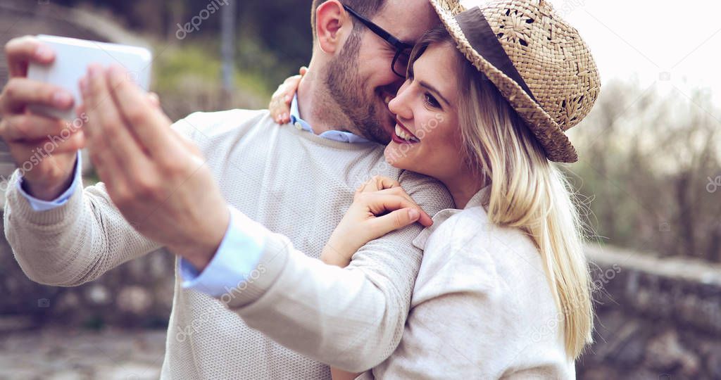 Couple in love taking selfies 