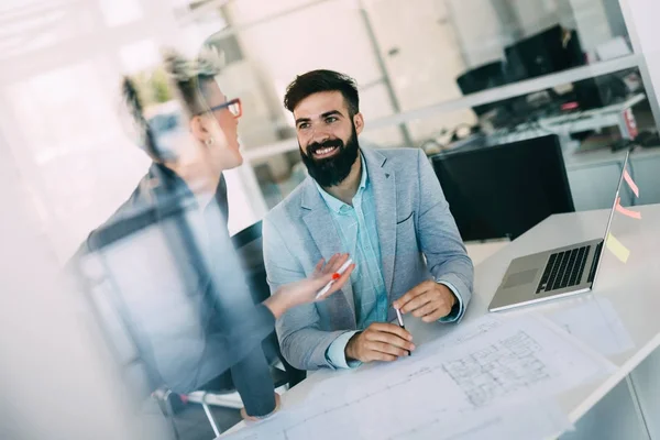 Portrait of young architects working in office — Stock Photo, Image