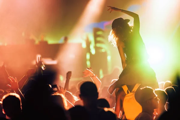 Cheering crowd with hands