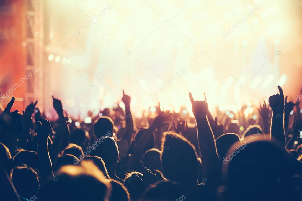 Cheering crowd with hands 