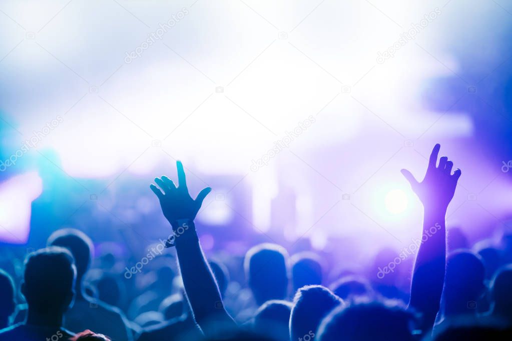 Cheering crowd with hands 