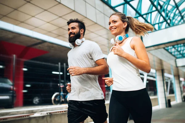 Couple running together — Stock Photo, Image