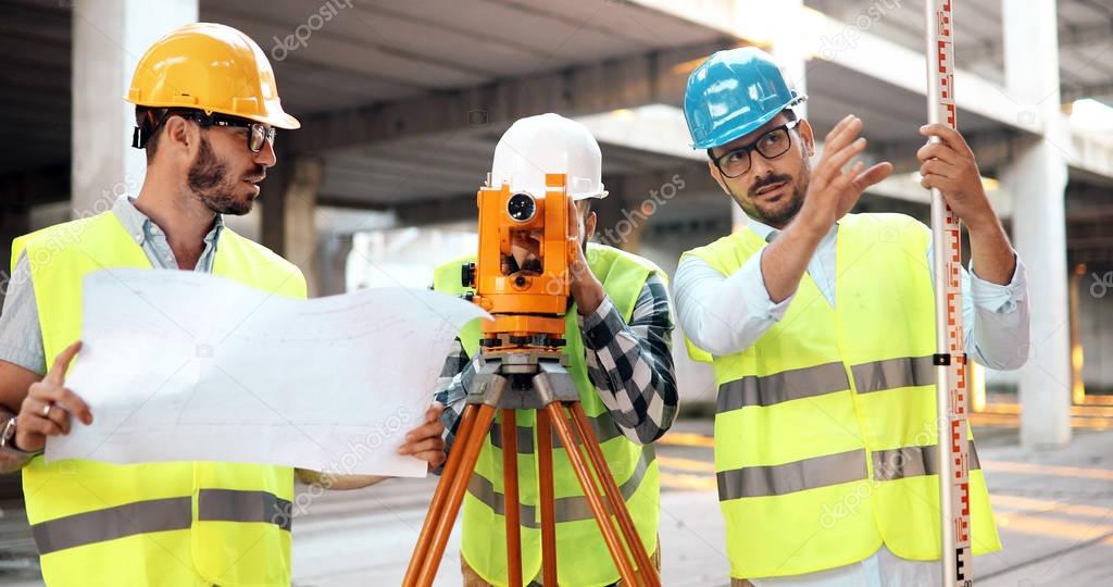 Portrait of construction engineers working 