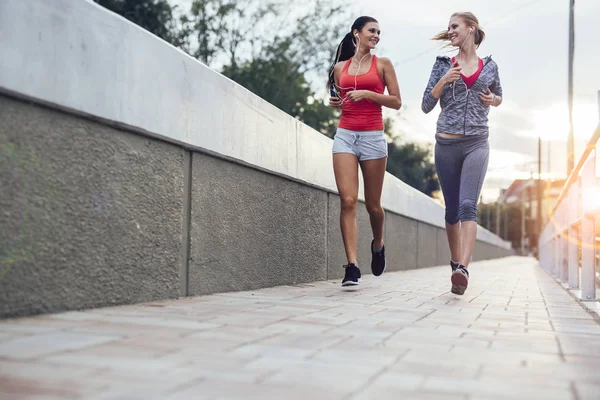 Beautiful two female joggers — Stock Photo, Image