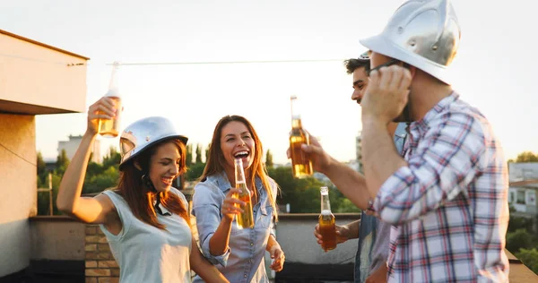 Friends having party on rooftop — Stock Photo, Image