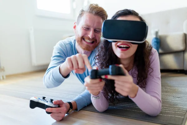 young couple playing video games