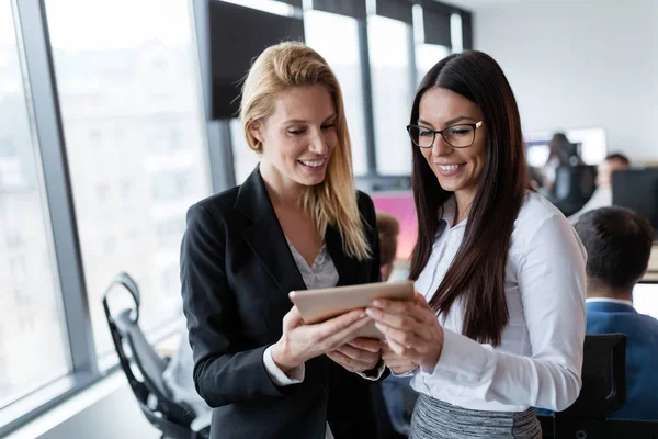 Businesspeople using digital tablet — Stock Photo, Image