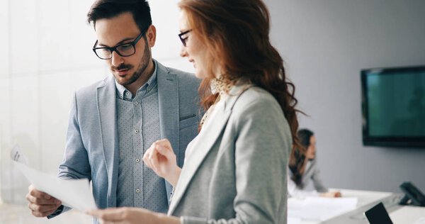 Business meeting and presentation in modern conference room for colleagues