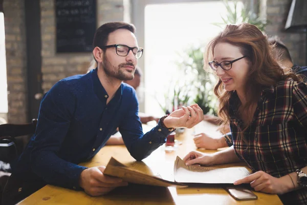 Flirting coworkers eating out and dating in restaurant