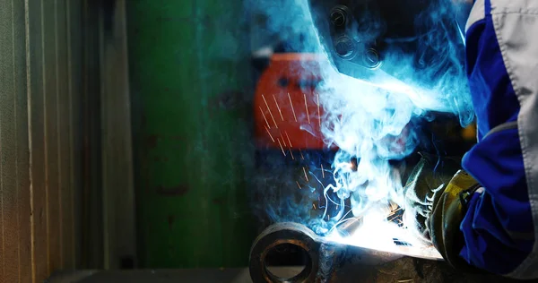 Industrial Worker at metal factory Stock Photo