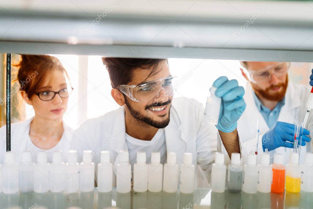 scientists working at laboratory