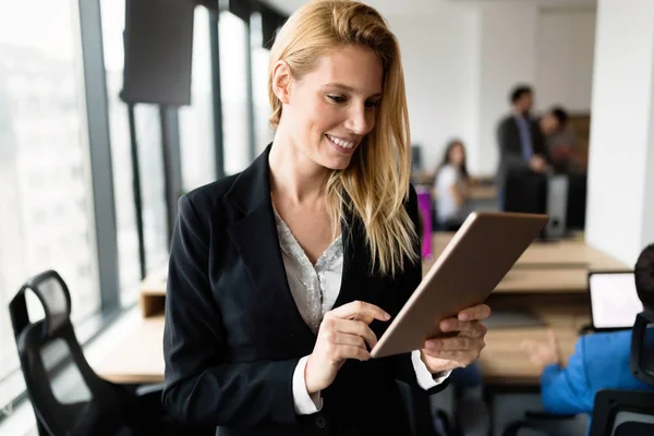 Portrait of successful businesswoman holding digital tablet — Stock Photo, Image