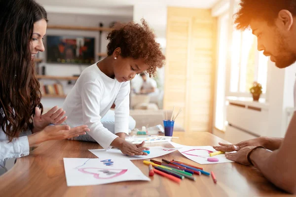 Mother and father drawing together with  child — Stock Photo, Image