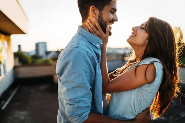 Beautiful couple in love dating outdoors and smiling — Stock Photo, Image