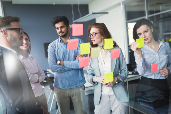 Creative professional business people working on business project in office