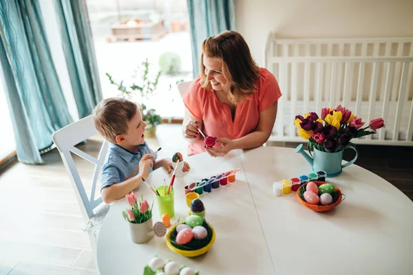 Happy Young Mother Son Sitting Table Painting Easter Eggs — Stock Photo, Image