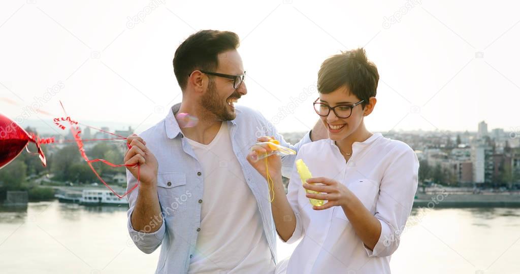 Young couple in love dating and smiling outdoor on valentine day