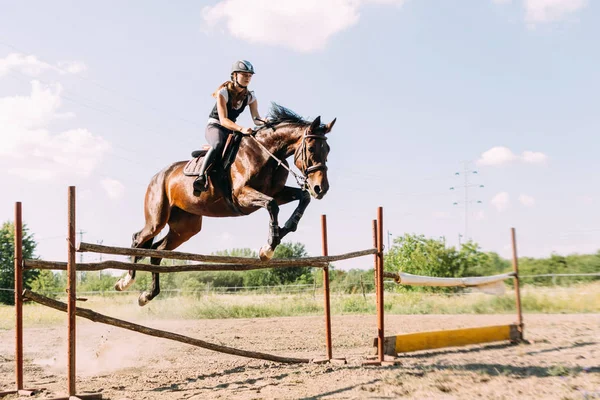 Young Female Jockey Her Horse Leaping Hurdle — Stock Photo, Image