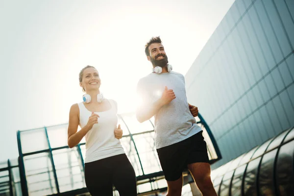 Young Fitness Couple Running Together Urban Area — Stock Photo, Image