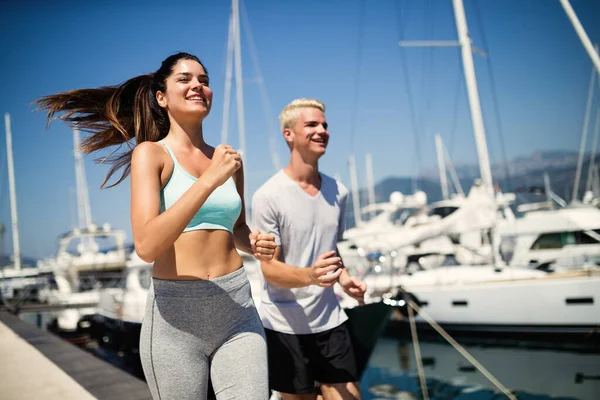 Löpare Fitness Par Löpning Utbildning Stranden — Stockfoto