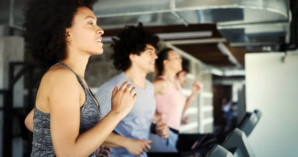 Young Fit People Running Treadmill Health Club — Stock Photo, Image