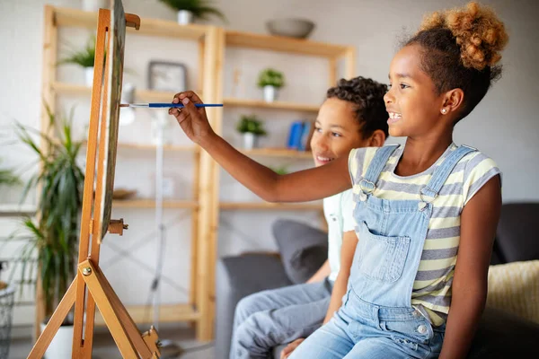 Concept of early childhood education, painting, talent, happy children