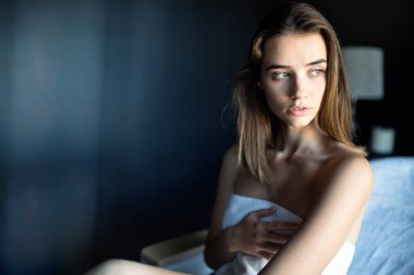 Wellness, massage, spa and beauty concept. Close up of beautiful woman in spa salon