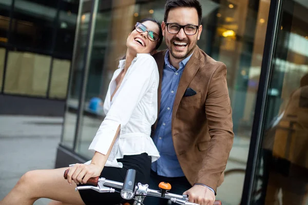 Attractive young business couple embracing at street — 스톡 사진