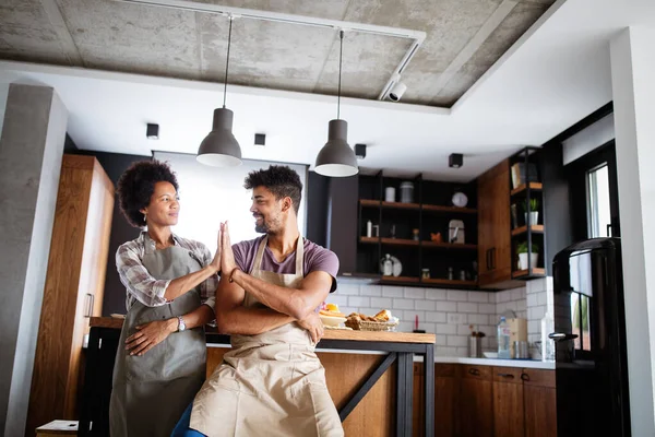 Young Happy African Couple Aprons Giving High Five Kitchen — Stock Photo, Image