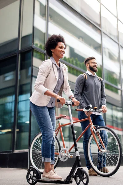 Happy Interracial Couple Using Electric Scooter Bicycle City Green Eco — Stock Photo, Image