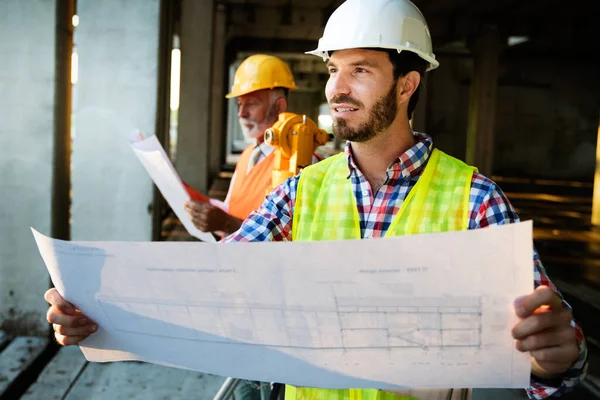 Team Construction Engineers Architects Working Building Site — Stock Photo, Image