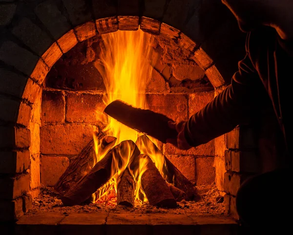 A fire burns in a fireplace — Stock Photo, Image