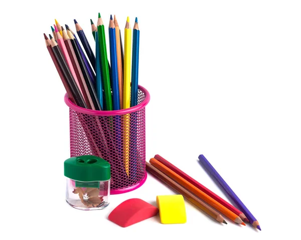 Colored pencils in the basket, Eraser and pencil sharpener on wh — Stock Photo, Image