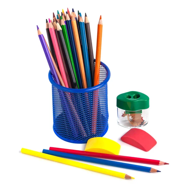 Colored pencils in the basket, Eraser and pencil sharpener on wh — Stock Photo, Image