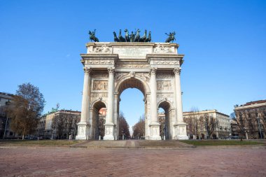 Historical marble arch Arco della Pace, Sempione square, Milan, 