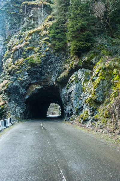 Tunnel in the rock on the road to Svaneti, Georgia — Stock Photo, Image