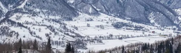Mountain village in the Caucasus Mountains in winter, Svaneti, G
