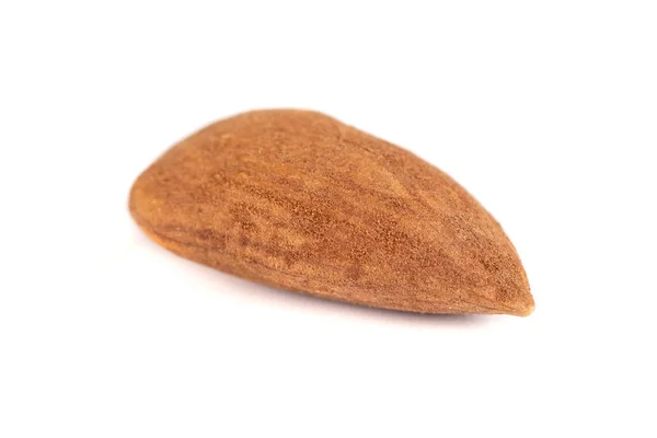 Almendra tostada marrón sobre fondo blanco —  Fotos de Stock