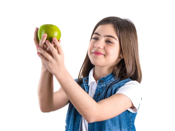 Schattig schoolmeisje met apple op witte achtergrond — Stockfoto