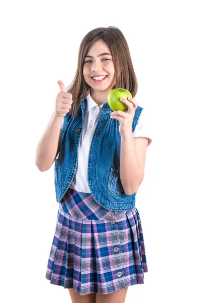 Söt skolflicka med apple på vit bakgrund — Stockfoto