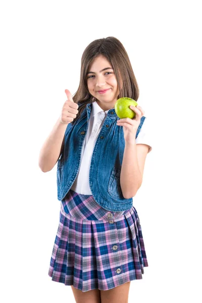 Söt skolflicka med apple på vit bakgrund — Stockfoto