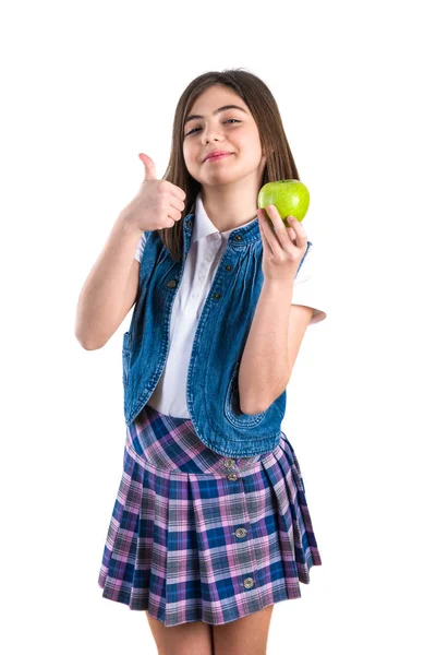 Studentessa carina con mela su sfondo bianco — Foto Stock